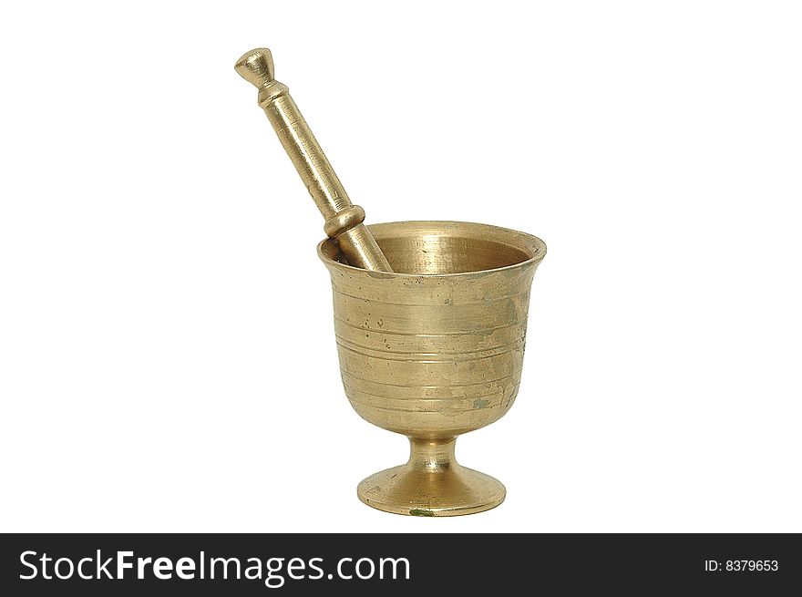 Antique brass mortar against a white background
