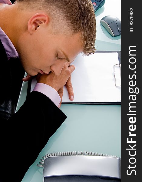 Close view of sleeping employee with white background