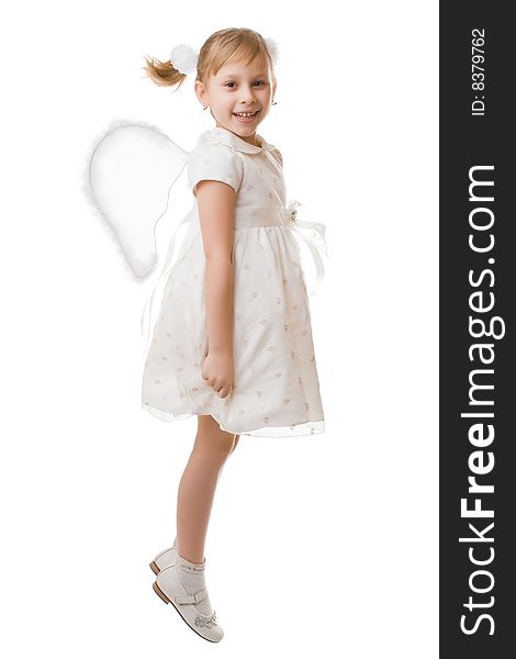 Girl in a white dress with wings isolated on a white background. Girl in a white dress with wings isolated on a white background