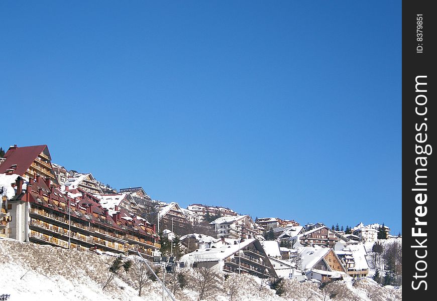 A landscape of a mountain little town in the italian alps.