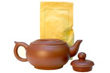 Pottery (clay) Teapot And Tea In Paper Bags. Royalty Free Stock Photography Pottery (clay) Teapot And Tea In Paper Bags. Royalty Free Stock Photography