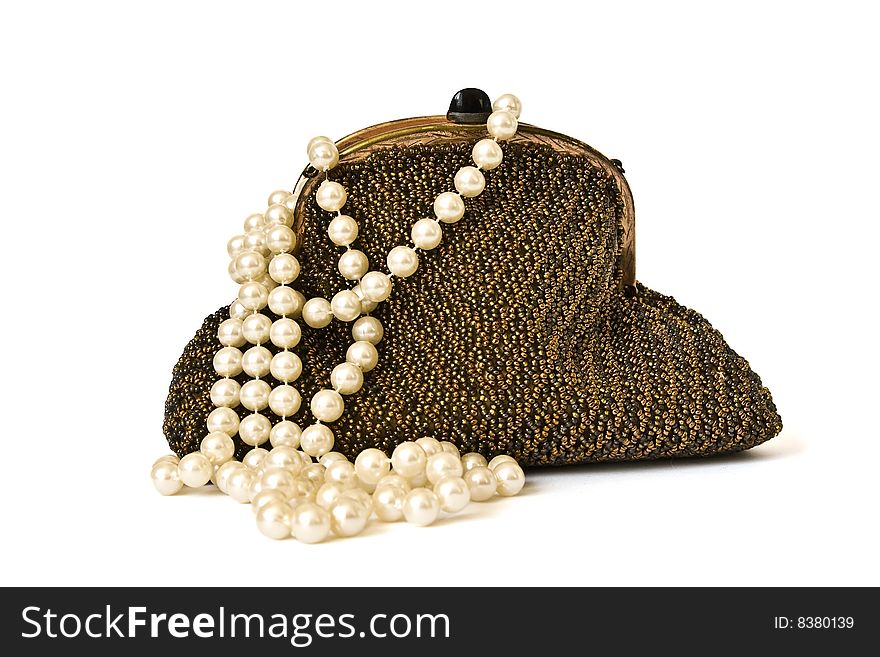 Theatre purse and a stack of pearls n white. Theatre purse and a stack of pearls n white