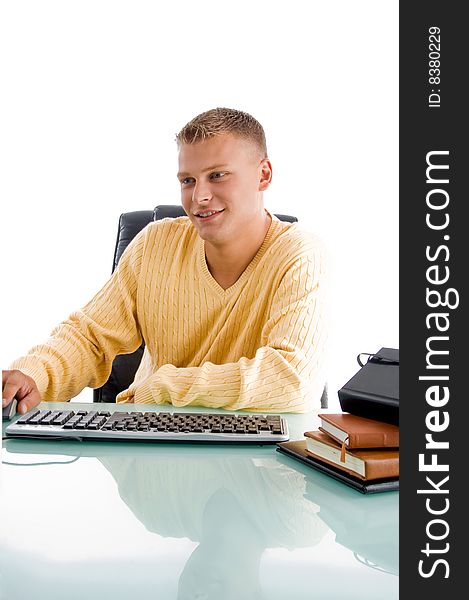 Man working on  desk with white background