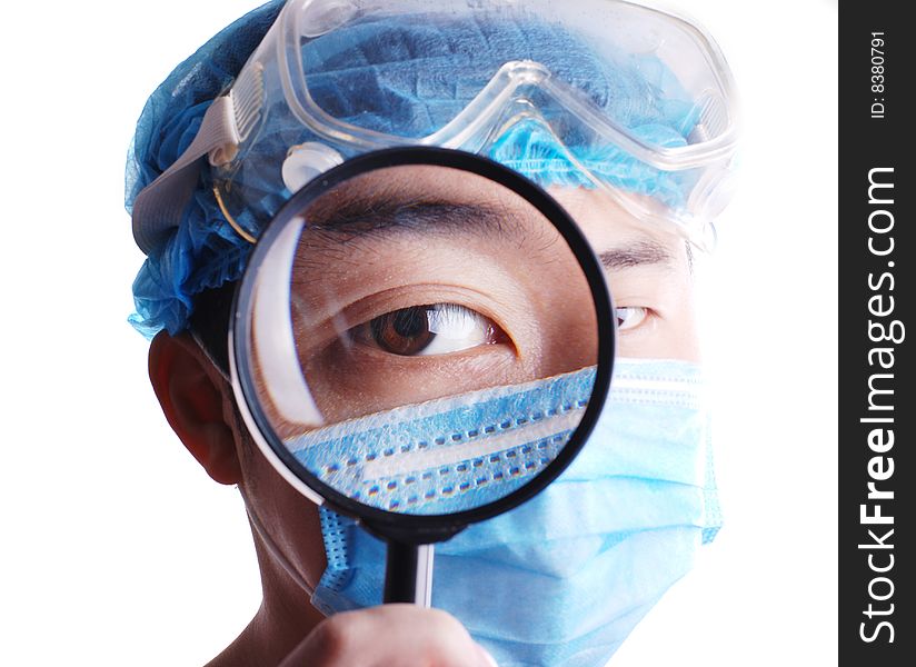 Doctor holding magnifier on an isolated white background