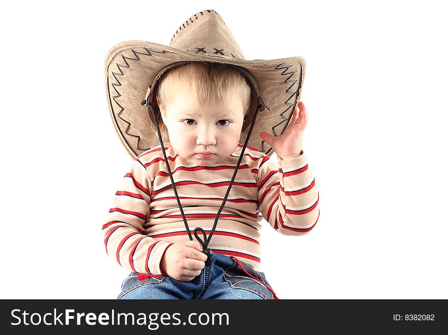 Little boy in cowboy hat isolated on white background