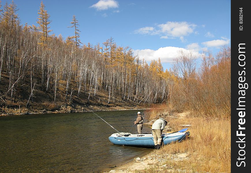 Boatfishing on river in Aljaska