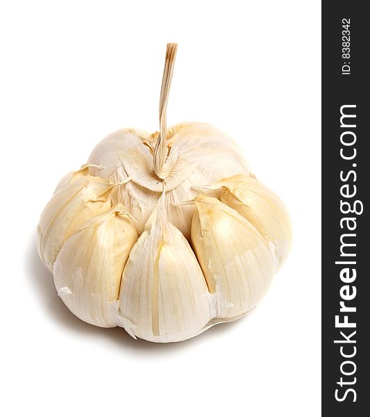 Healthy white vegetable garlic isolated white on background. Healthy white vegetable garlic isolated white on background