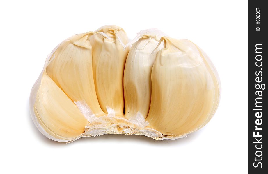 Healthy white vegetable garlic isolated white on background. Healthy white vegetable garlic isolated white on background