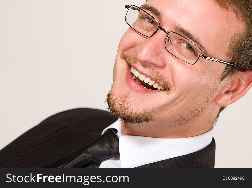 Handsome and cheerful young businessman portrait