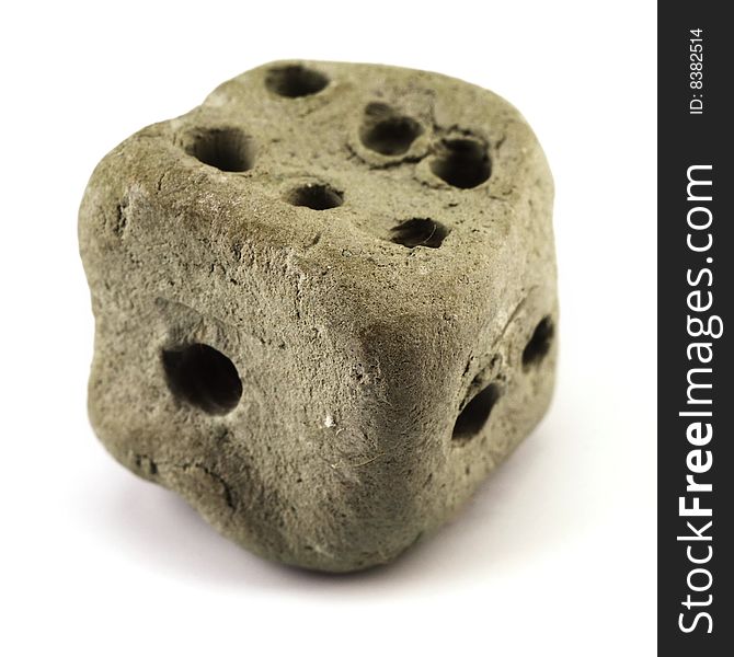 Clay die modeled by a child