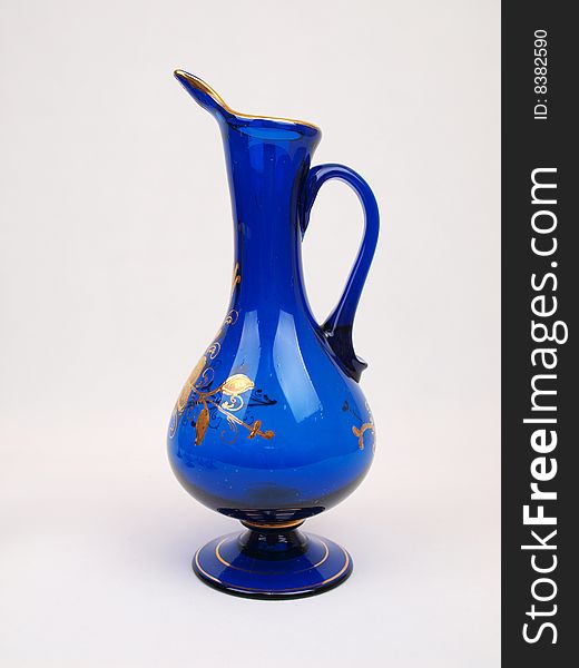 Exquisite Dark Blue Gold trimmed Crystal Decorative Glass Jug side view image two. Exquisite Dark Blue Gold trimmed Crystal Decorative Glass Jug side view image two