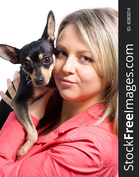 Young woman is embracing small dog (toy-terrier). Young woman is embracing small dog (toy-terrier)