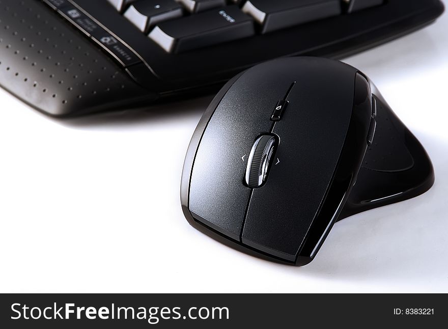 Close up of keyboard and mouse on white background