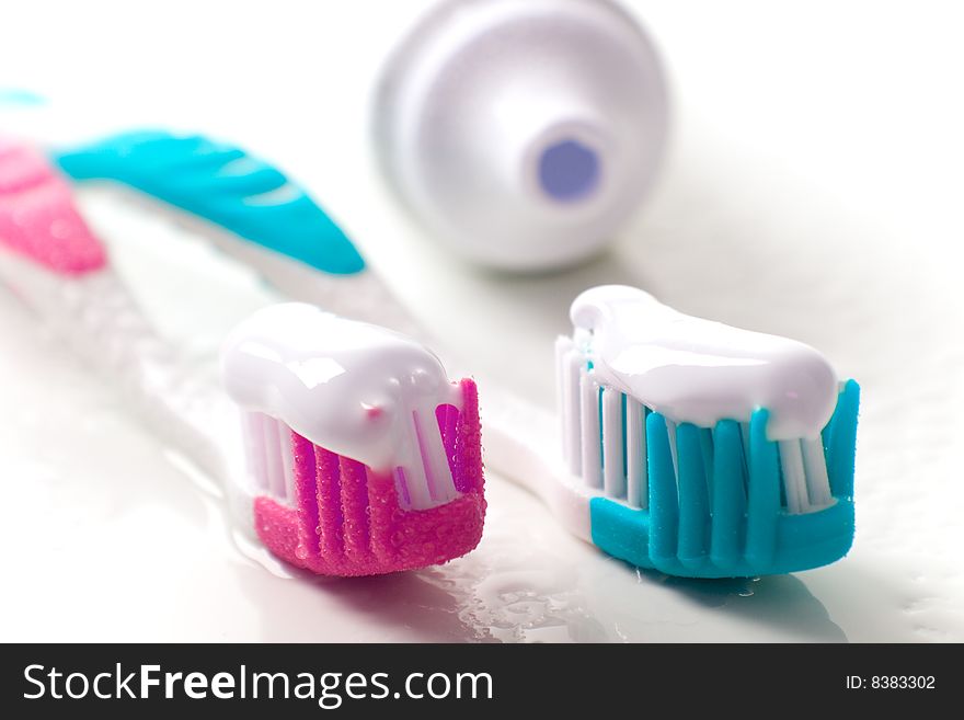 Toothpaste and toothbrushes closeup. dental care