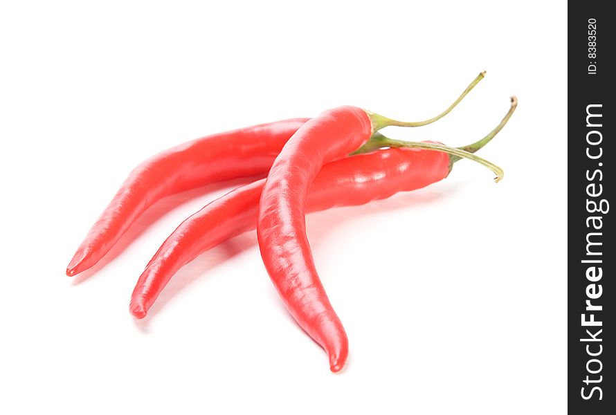 Red  chilly peppers   on white background