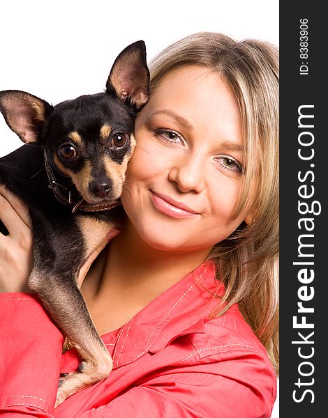 Young woman is embracing small dog (toy-terrier). Young woman is embracing small dog (toy-terrier)