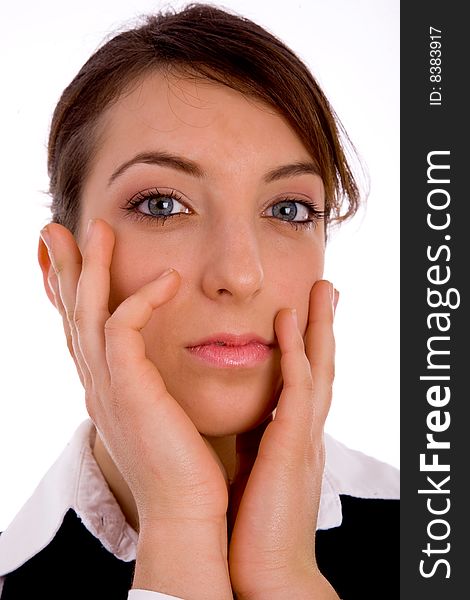 Front view of serious woman looking at camera against white background