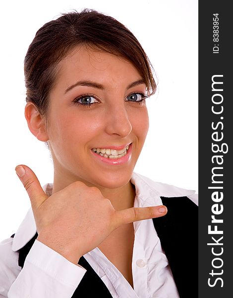 Front view of cheerful woman making phone call hand gesture on an isolated white background