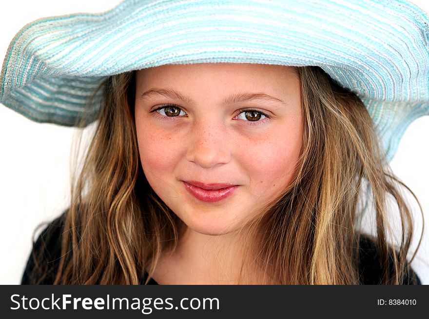 Girl smiling wearing a hat. Girl smiling wearing a hat.
