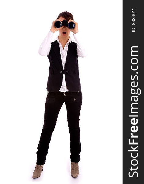 Full body pose of professional looking through binoculars against white background