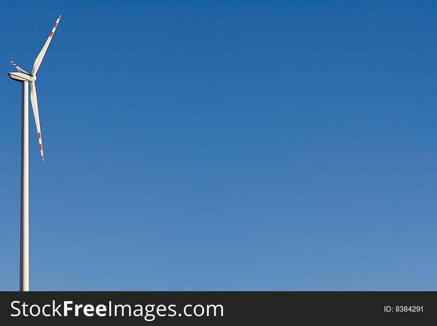 Windmill with Blue Sky in the background and space for text