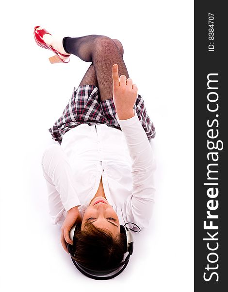 High angle view of pointing female listening music on an isolated white background