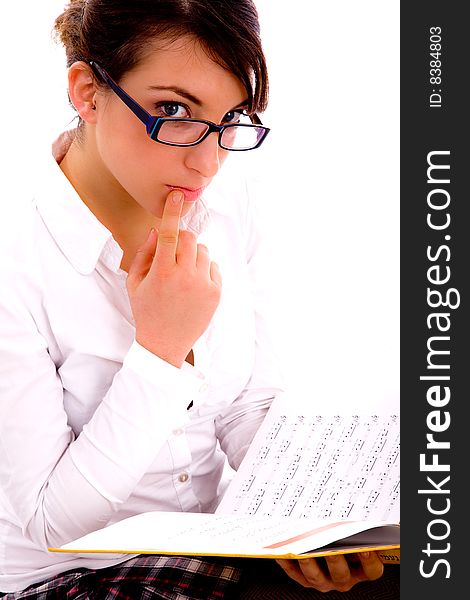 Side pose of female student with books on an isolated white background