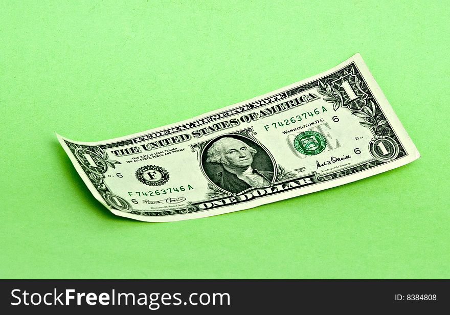 One Dollar Isolated On Green Background