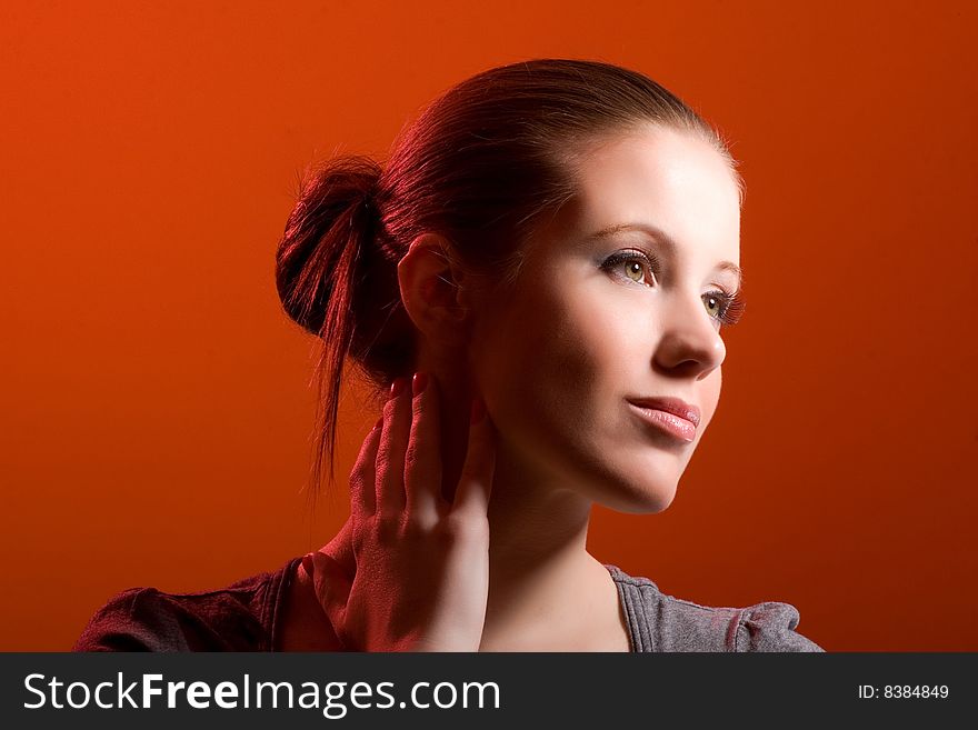 Young woman isolated on orange background. Young woman isolated on orange background