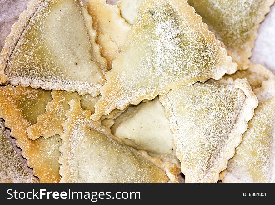 Close up shot of stuffed ravioli pasta. Close up shot of stuffed ravioli pasta