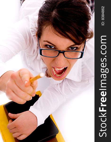 High angle view of shouting female pointing with pencil with white background