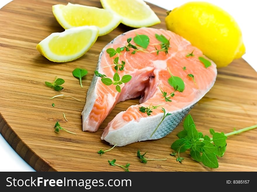 Salmon Raw On The Wooden Background With Thyme And