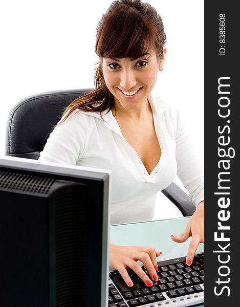 Front view of  businesswoman in office against white background. Front view of  businesswoman in office against white background