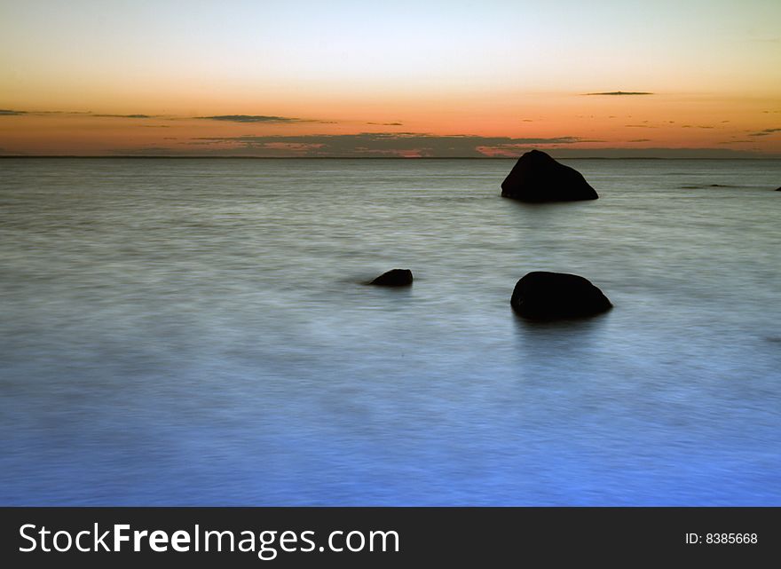 Sunset on the coastline. Romantic sky. Sunset on the coastline. Romantic sky.