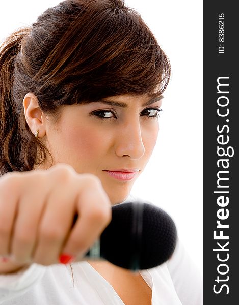 Side view of woman showing microphone with white background