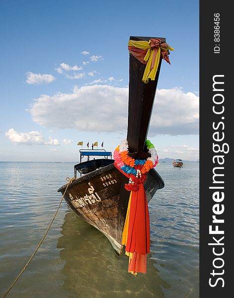 Traditional Thai boat on water