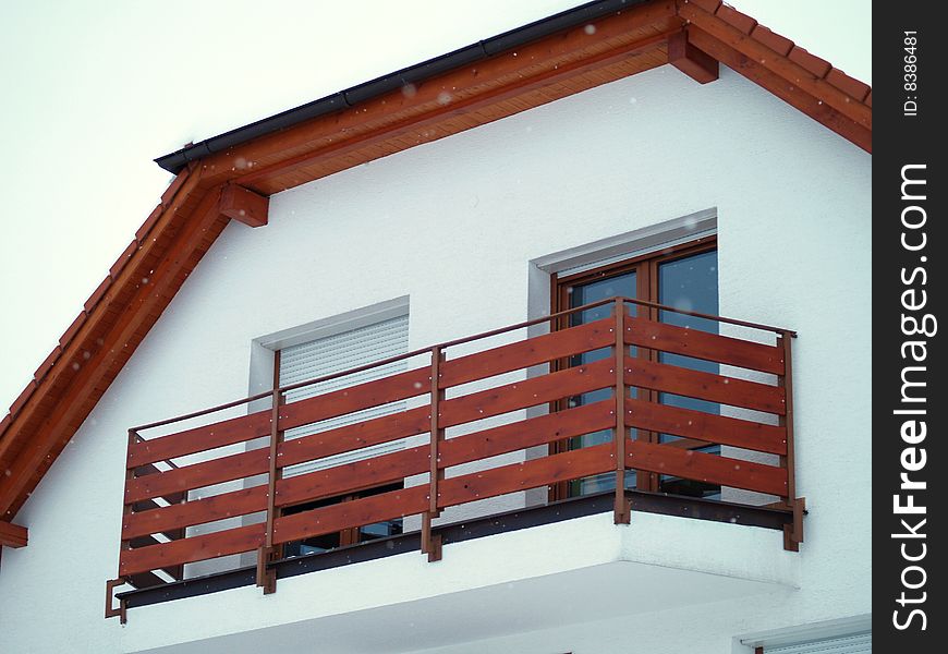 Detail of balcony and wooden railing