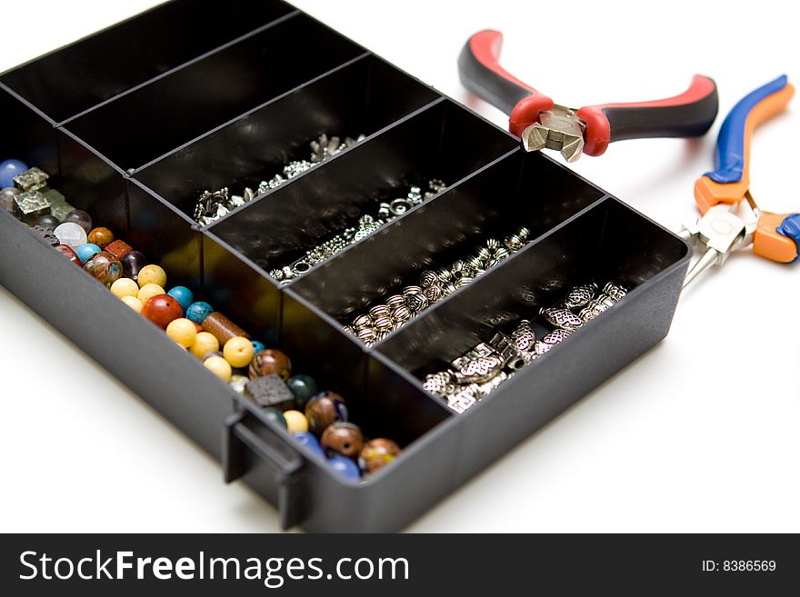 Jewellery making on a white background