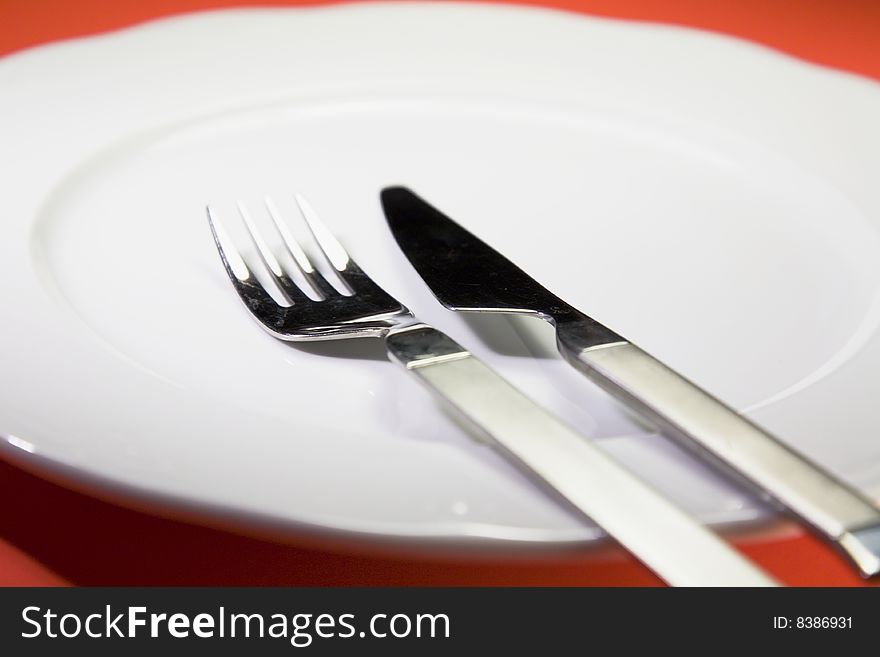 Single plate against red background