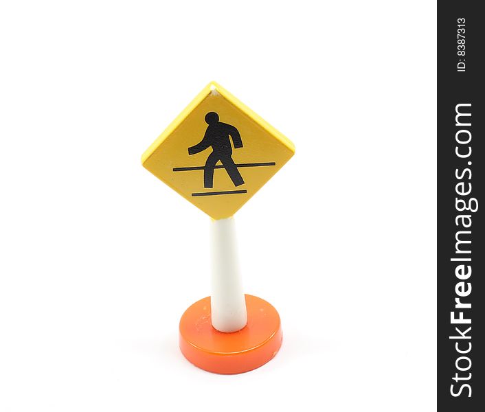Toy pedestrian crossing on a white background.
