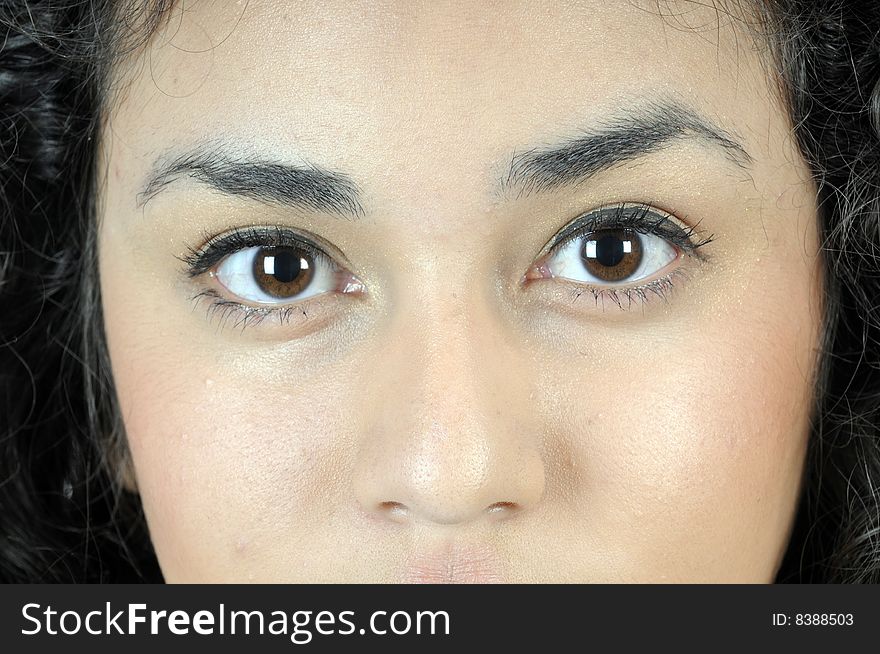 Beautiful young hispanic brunette woman in closeup. Beautiful young hispanic brunette woman in closeup