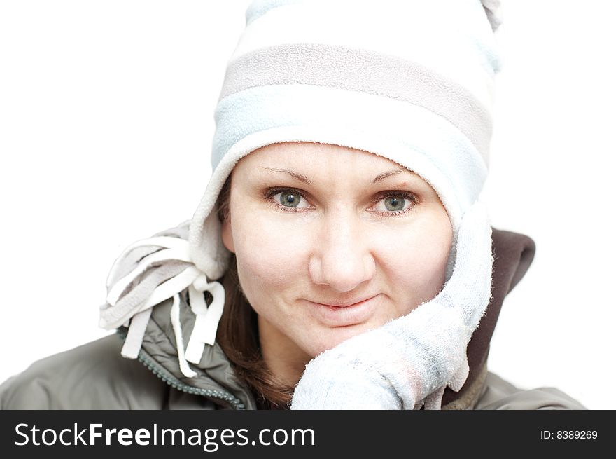 Yound attractive woman in white winter hat