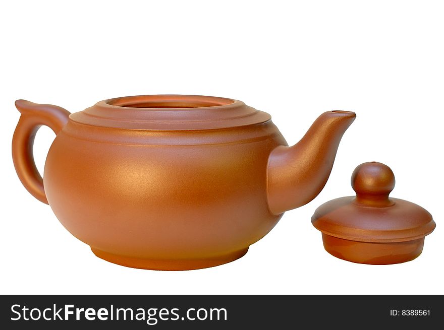 Open chinese pottery (clay) teapot on isolated background. Open chinese pottery (clay) teapot on isolated background.
