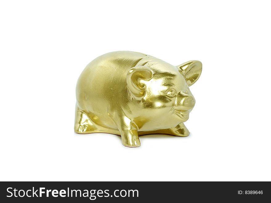 Golden piggy bank isolated on white