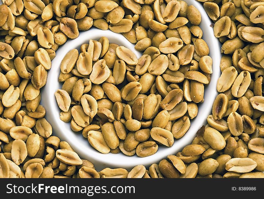 Earthly hazel-nut piled up into a decorative dish.