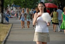 Woman Eating Cotton Candy Royalty Free Stock Photography Woman Eating Cotton Candy Royalty Free Stock Photography