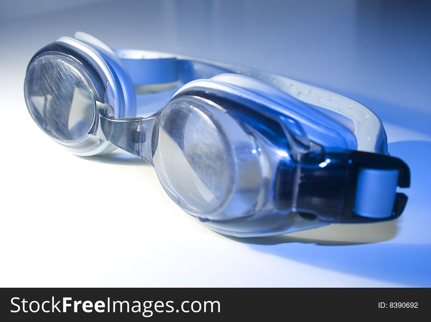 Close-up of blue-gray swimming glasses. Close-up of blue-gray swimming glasses