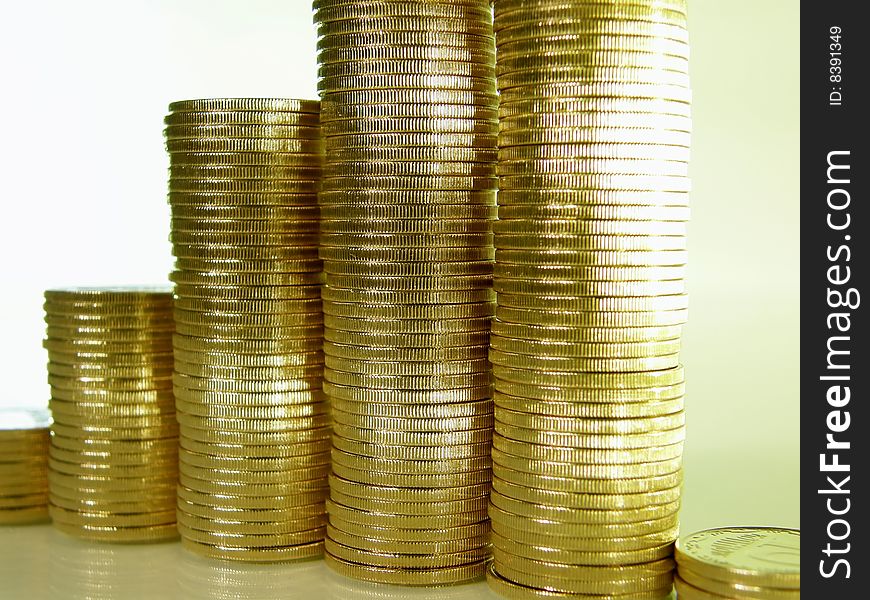 Diagram consisting of piles of coins, denotes the growth and decline. Diagram consisting of piles of coins, denotes the growth and decline