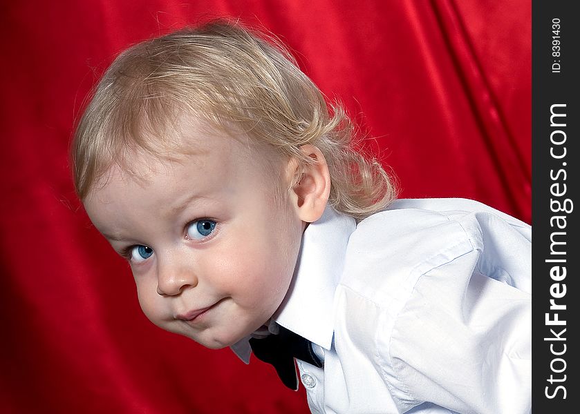 The nice Little boy in a white shirt