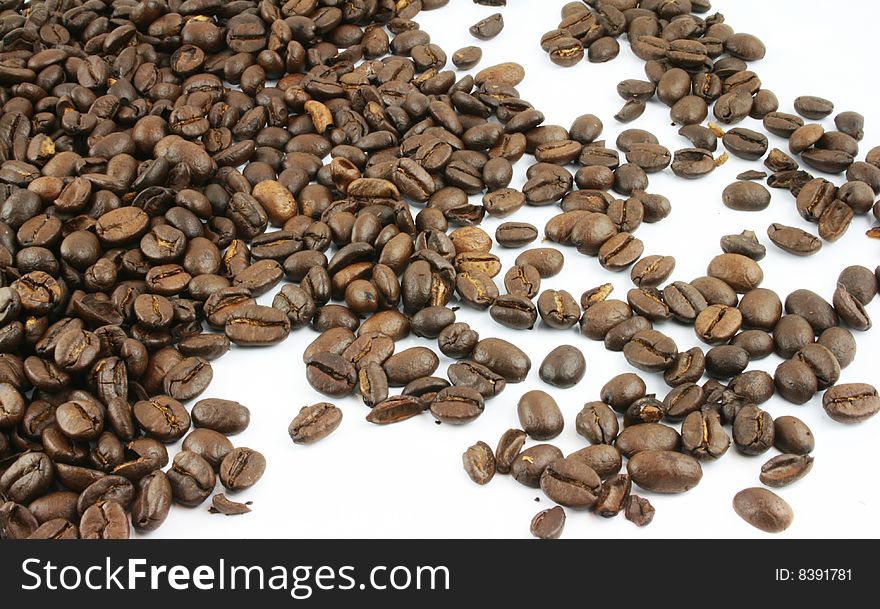Coffee Beans spread on a white background. Coffee Beans spread on a white background